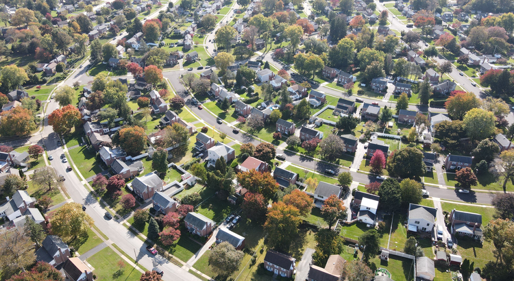 aerial view of suburban housing with radial curving streets