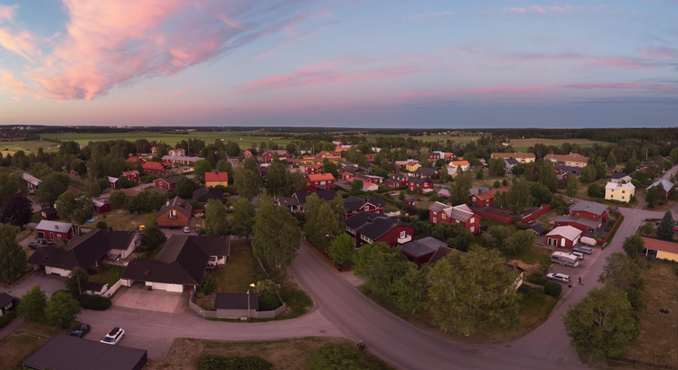 aerial shot of suburban neighborhood at dusk